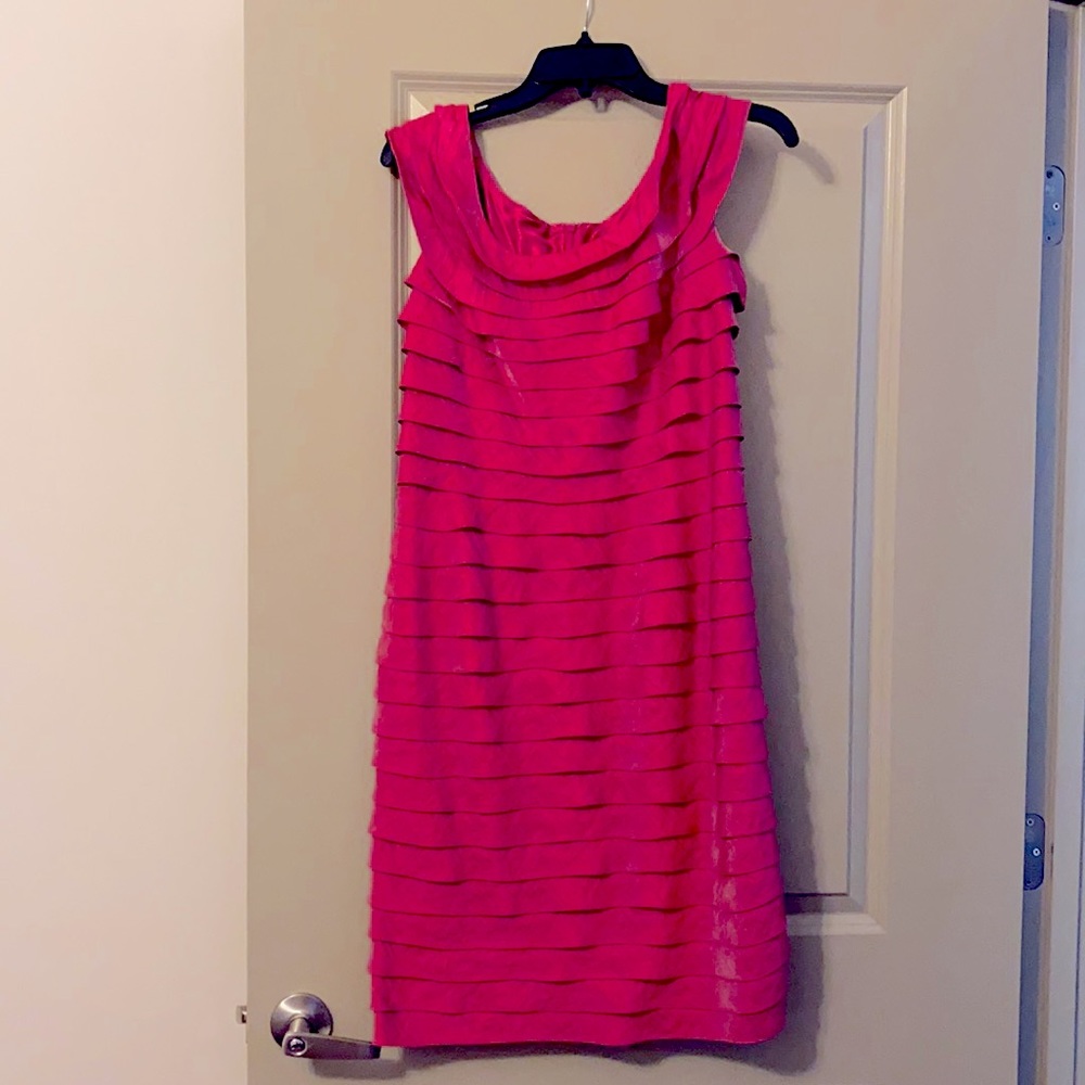 Pink flirty dress.